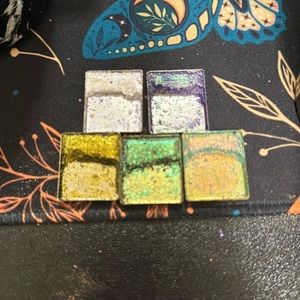 Samples of Clionadh multichrome single eyeshadows Weathered, Mural, Citron, etc